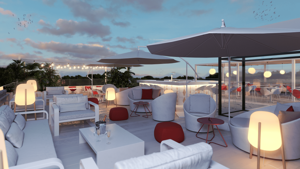 Terraza rooftop del Hotel Portocristo en Mallorca diseñada por Kika Sagristà con mobiliario blanco y detalles en rojo al atardecer